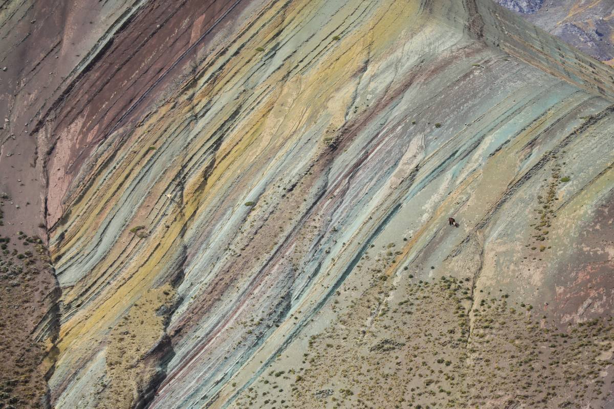 Close-up detail of abstract expressionism art mountains with thick paint texture